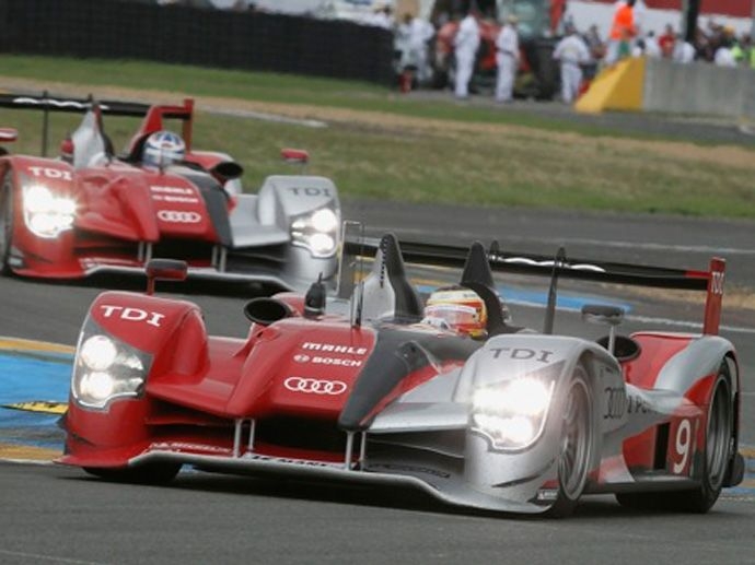 2010. Le Mans' Winner Audi Sport North America Mike RockenfellerTimo BernhardRomain Dumas