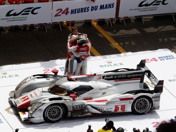 2012. 80. výročí závodu v Le Mans zdobí Audi jedoucí na kolech OZ svým již 11. vítězstvím.